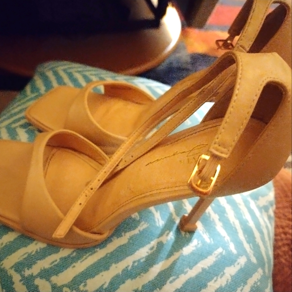Brand new baige leather ankle strapped high heels